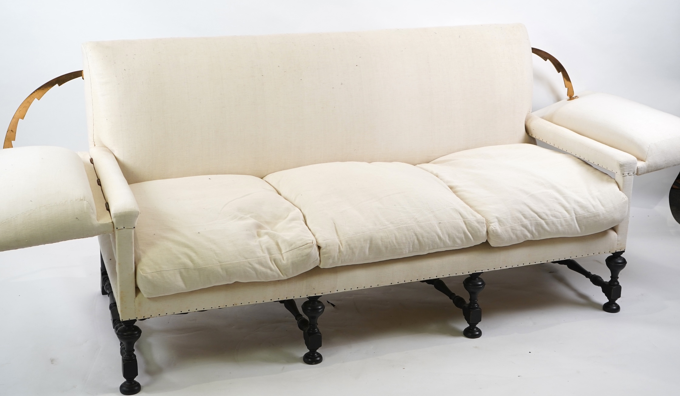 A Jacobean revival Knowle type three seater sofa